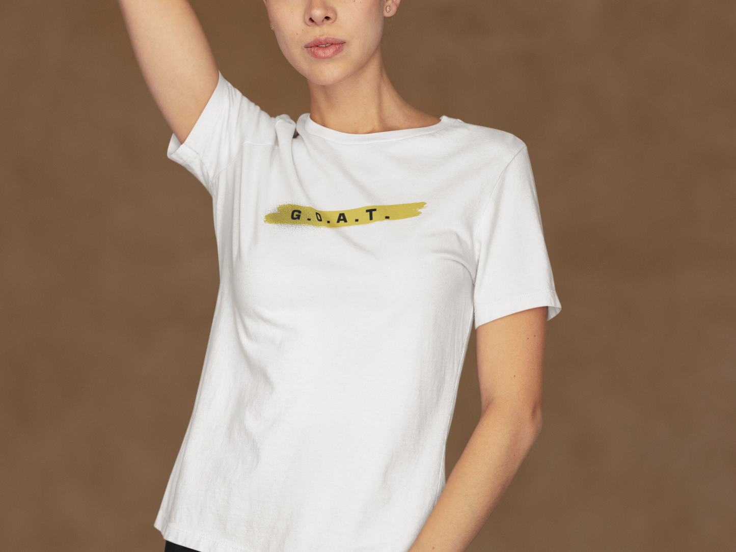 "G.O.A.T." on Gold Brushstroke Unisex T-Shirt – Your Everyday Statement Tee